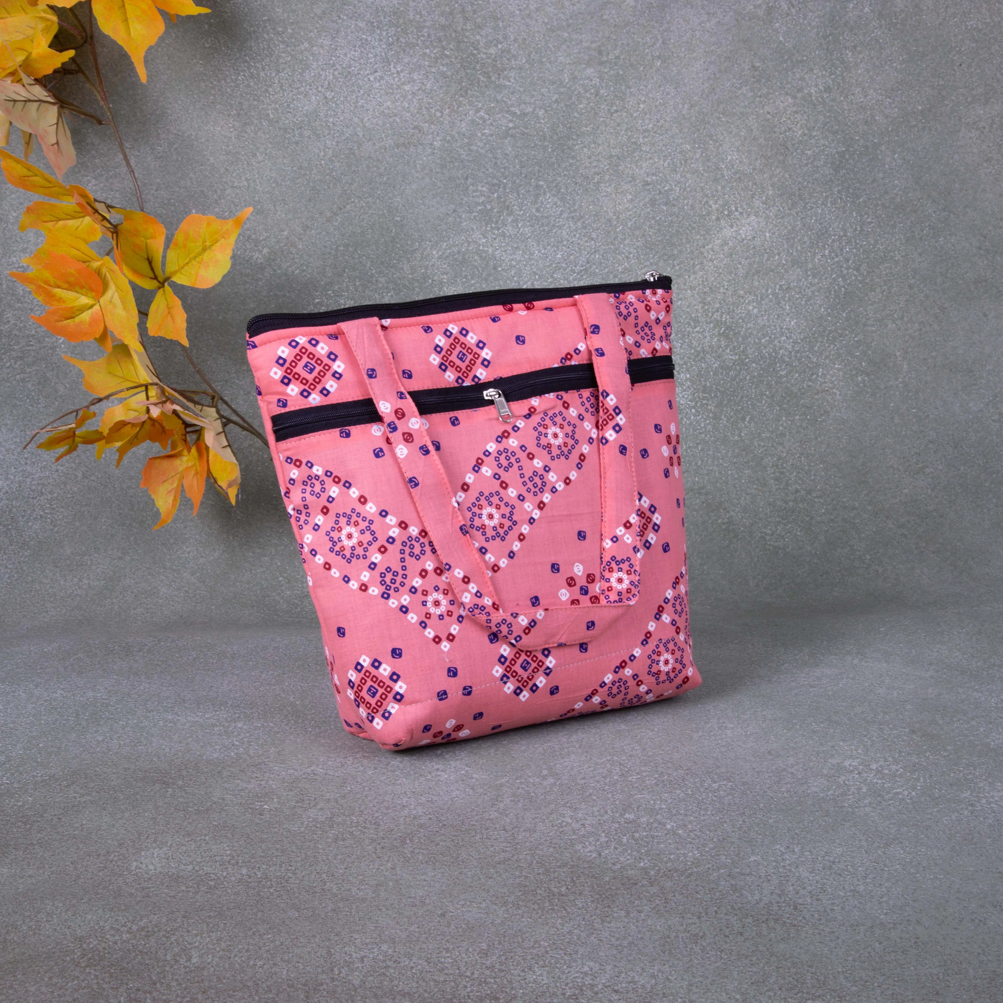 Small Handbag Peach Colour with Dots Design.